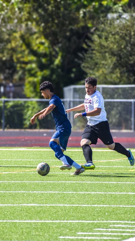 Battling for possession in the midfield.