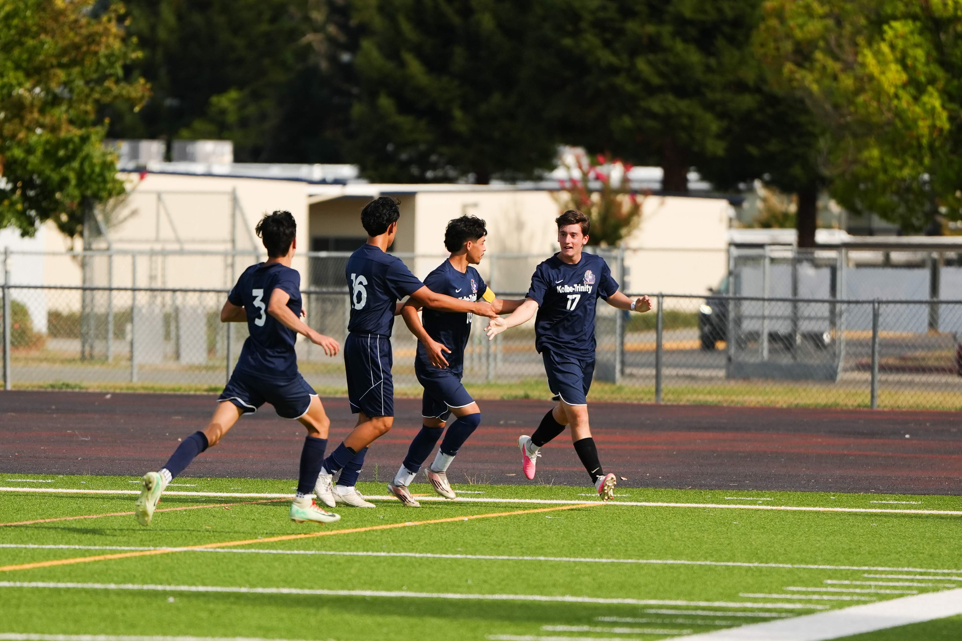 Crusaders celebrate together after a big play.